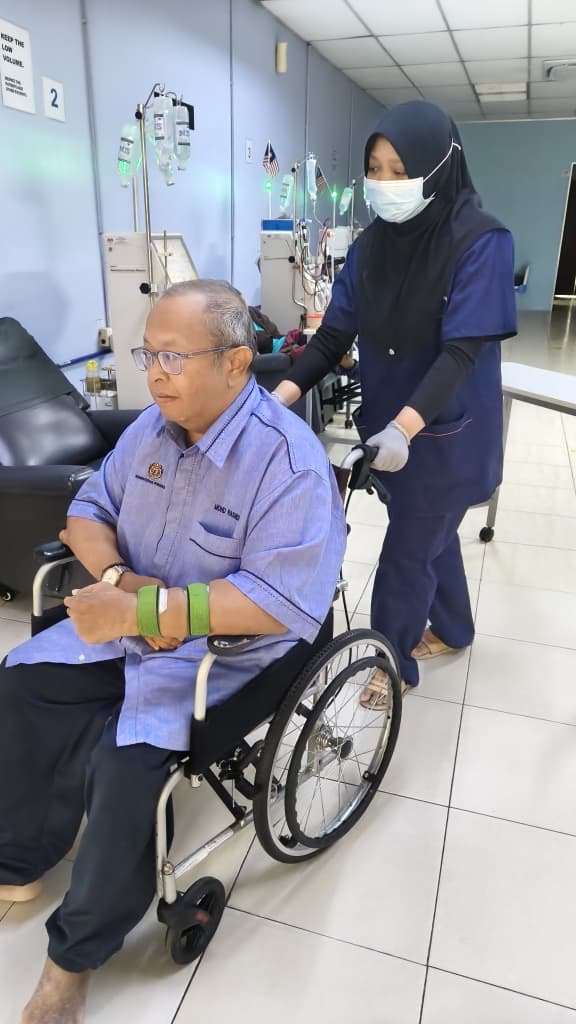 Staff nurse supporting patient